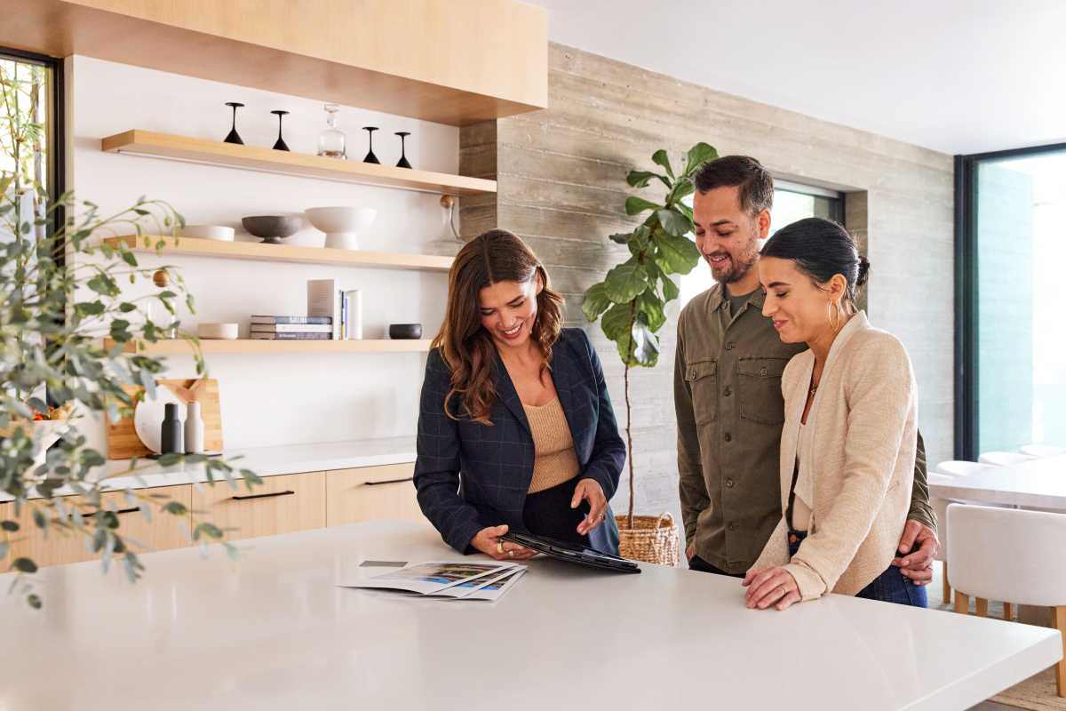 Agent reviewing paperwork with a seller